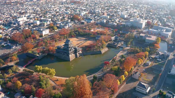 Aerial View 4k footage of Matsumoto Castle on morning in Matsumoto city alt