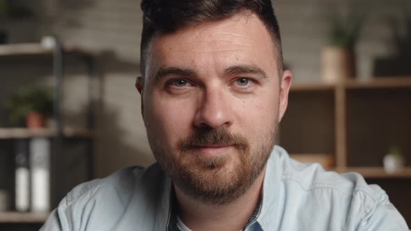 Smiling Bearded Millennial Professional Businessman Looking at Camera alt