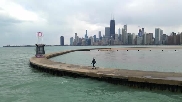 person walking in north chicago lake michigan, fitness and sports, visit travel explore illinois alt