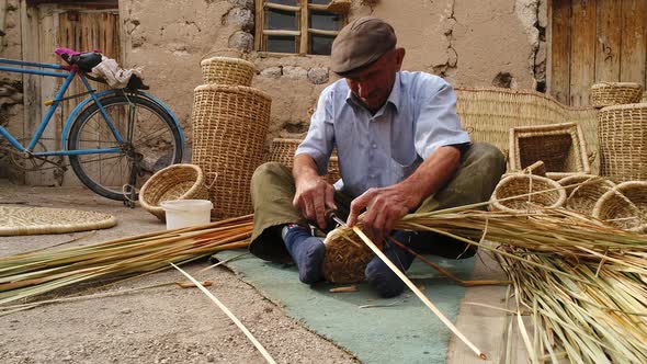 Hands Man Weaving Basket alt