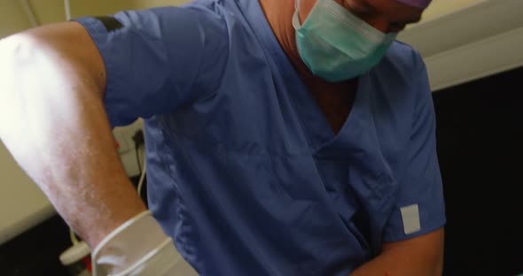 Surgeon operating a dog in operation theater. 4k