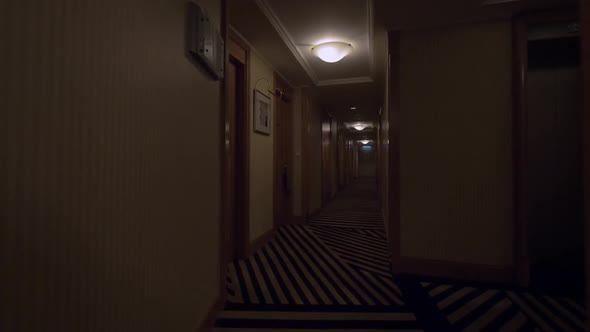Clip of Going Along the Hotel Corridor To Lighted Exit Sign. Hong Kong, China alt