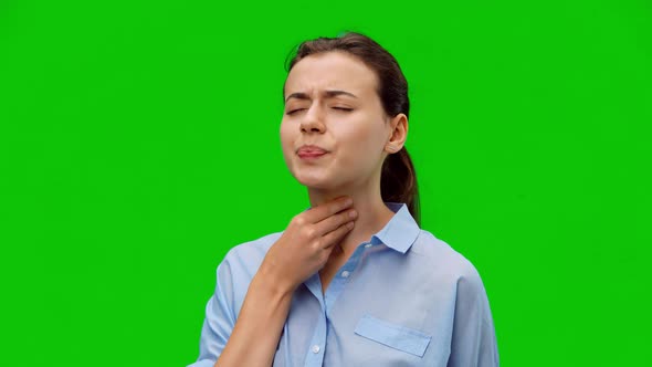 Throat pain. Woman holding her inflamed throat.