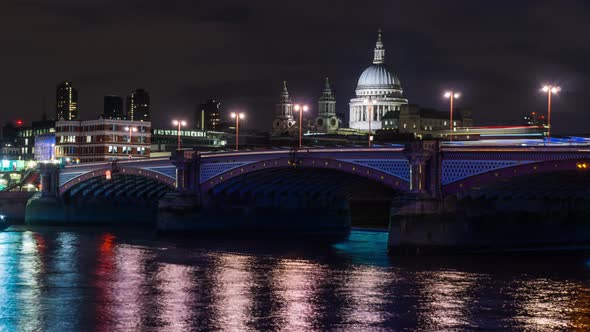 Blackfriars Bridge over the River Thames and The St Paul's Cathedral at night, London, UK alt
