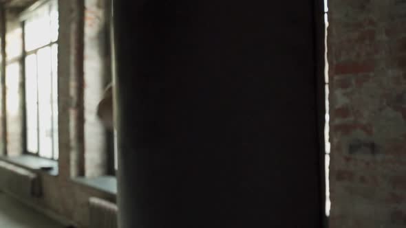 Male Boxer Boxing in Punching Bag Slow Motion alt