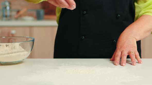 Hand Spreading Flour alt