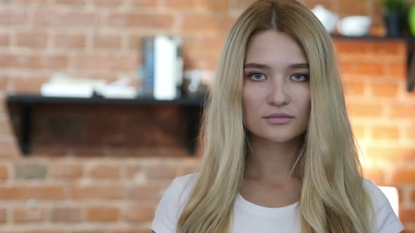 Portrait Of Young Blond Girl alt