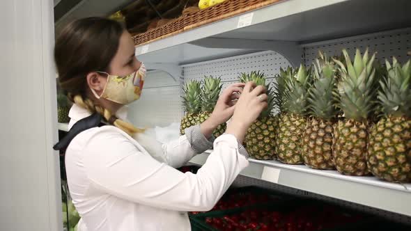 The Woman in the Masked Shop Chooses the Pineapple