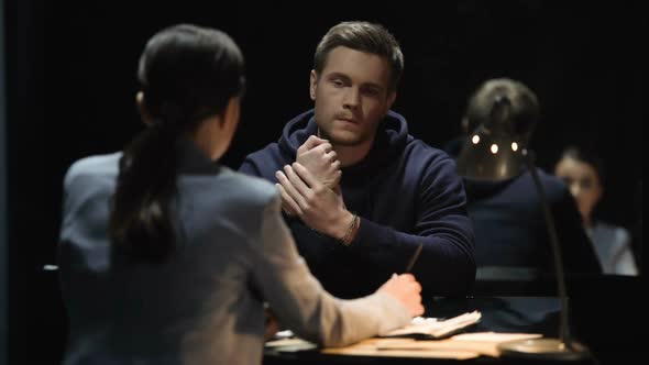 Female Defense Lawyer Writing Accused Robber Statement, Woman Danger Occupation alt