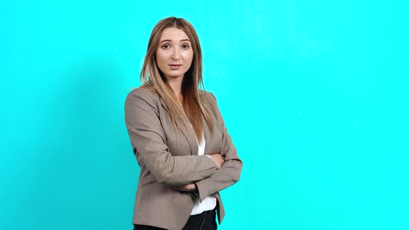 Profile Portrait of Excited Young Woman with Long Brown Hair, Looking Surprisingly at the Room alt
