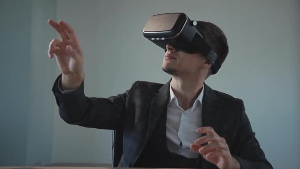 Funny Male Entrepreneur Relaxing While Playing with VR Glasses