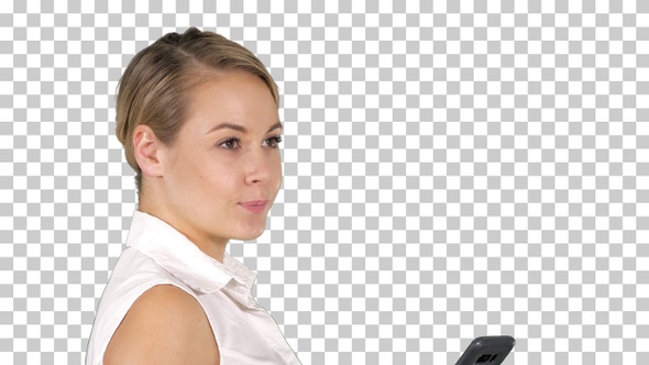 Young beautiful woman writes an SMS, Alpha Channel alt