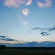 Clouds Move Across the Blue Sky at Sunset. - VideoHive Item for Sale