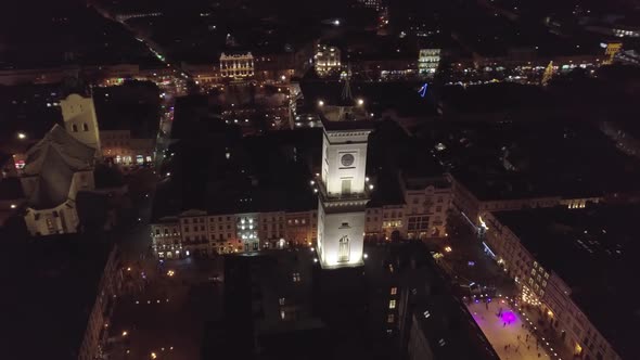 Arial City Lviv Ukraine Rynok Square Town Hall Christmas Fair People Skate on Ice Skating Rink alt