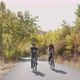 Couple Riding Bikes On Road - VideoHive Item for Sale