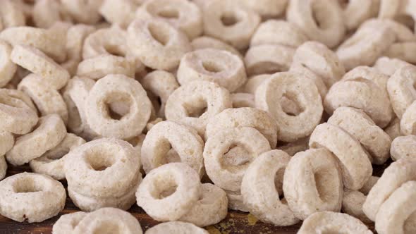 Large Pile of Dry Corn Flakes for Breakfast Close Up