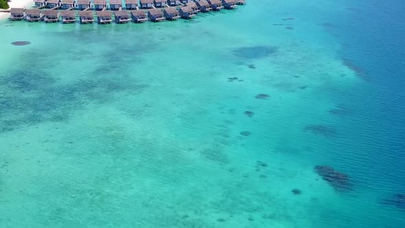 Drone tourism of marine coastline beach by blue ocean with sand background alt