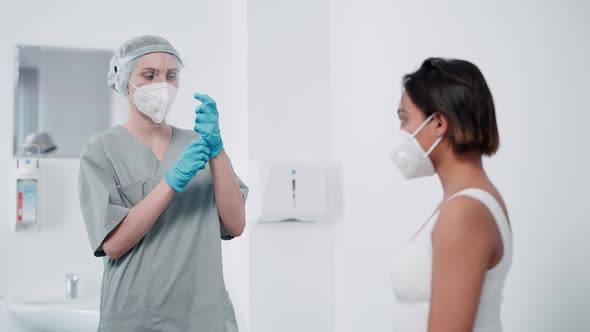 Young Female is Vaccinated Against the New Coronavirus Covid19 in a Modern Clinic the Formation of alt