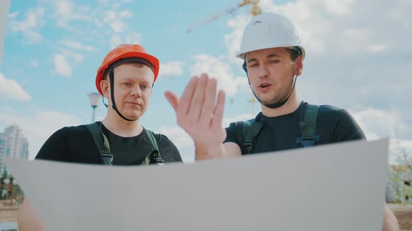 An Builders Are Studying Construction Plan and Analyze Are Building Construction alt