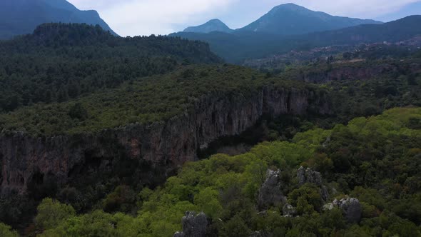 Cliffs and Crags of Geyikbayiri Village on Sunny Day alt