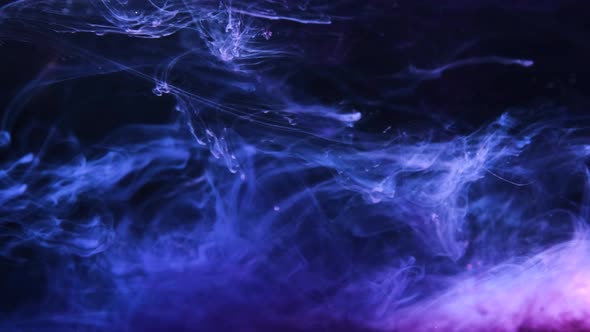 Colorful Ink and Paint Liquid Reaction. Background Texture alt