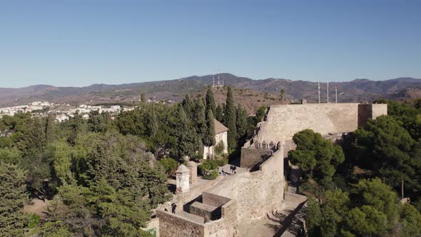Malaga alcazaba in Spain. Aerial reverse ascending
