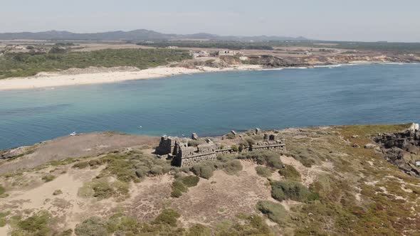 Fly over Santo Alberto do Pessegueiro towards Pessegueiro sand beach, Porto Covo