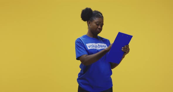 Young Volunteer Looking at Camera alt