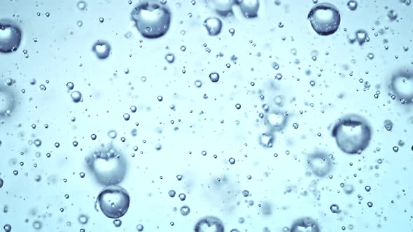 Super Slow Motion Macro Shot of Rising Various Bubbles in Water at 1000 Fps alt
