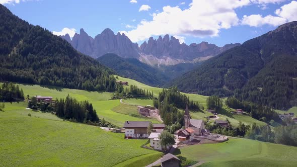 Aerial travel drone view of South Tyrol, Italy and the Dolomites mountains. alt