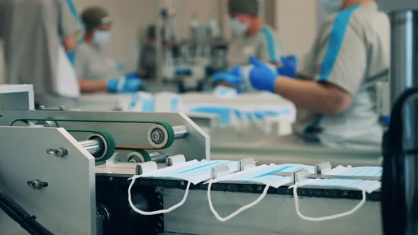 Transporter with New Medical Masks Getting Relocated By It alt