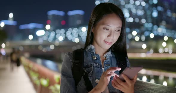 Woman Use of Mobile Phone in City alt