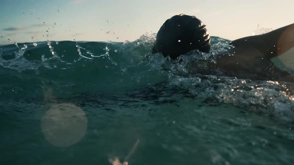 Triathlete Swimming On Lake.Professional Swimmer. Swimmer Athlete. Thriathlon Simmer Triathlete  alt