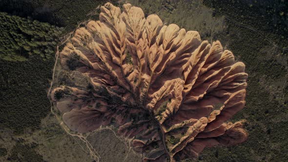 Aerial vertical view of sandstone cliffs in Las Cárcavas. Madrid, Spain. alt
