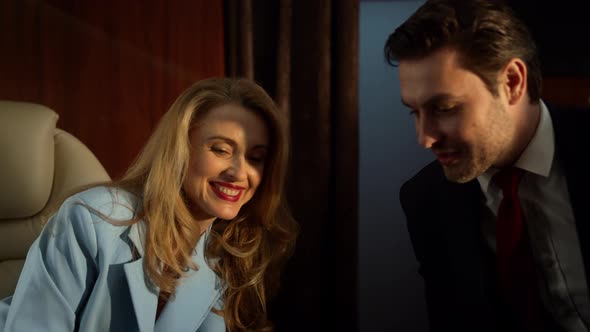 Successful Businesswoman Talking Deal with Partner in Golden Sunlight Closeup alt