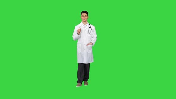 Orthopedist Talking To Camera and Dancing After Everything Will Be Fine on a Green Screen, Chroma alt