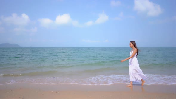 Asian woman enjoy around beautiful beach sea ocean alt