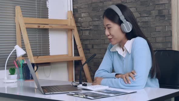 Teachers are teaching through laptops or broadcasting live in the classroom. alt