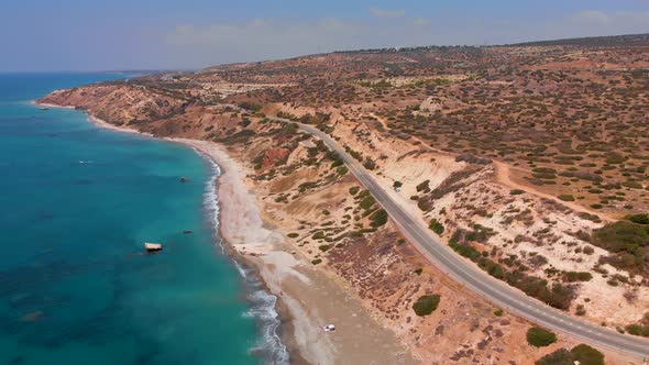 Aerial view flying over the coast of Paphos Cyprus and the Mediterranean Sea alt
