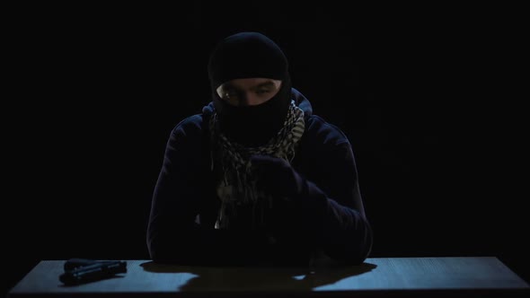 Terrorist Writing Video Message with Threats and Warnings, Global Attack alt