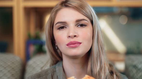 Closeup Face of Adorable Dieting Girl Bites Fresh Pastry Food Feeling Pleasant alt