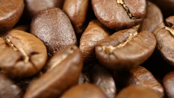 Coffee Beans in Rotate Perfectly on a Turntable. Close Up. Rotating alt