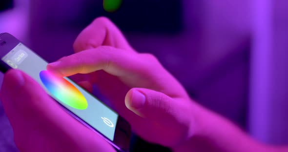 Changing Color Light in Home. Smart Home Automation. House Managing with Smartphone App alt