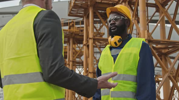 Site Supervisor and Foreman Shaking Hands alt