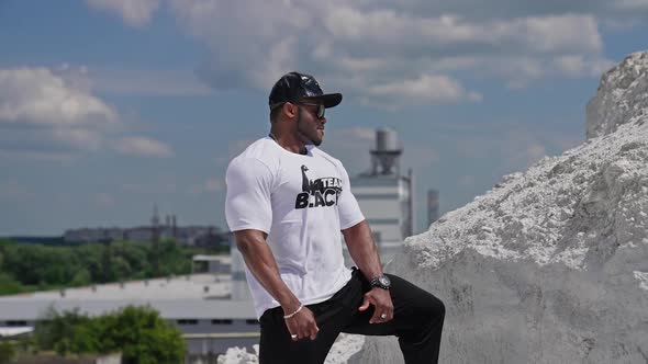 Portrait of handsome young african man posing outdoor alt