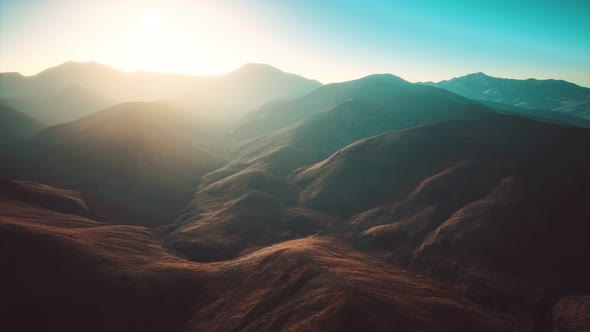 Hills with Rocks at Sunset alt