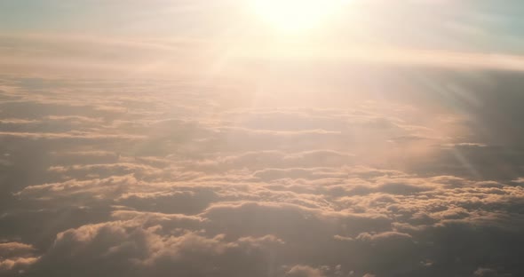 Clouds Illuminated By Golden Rays of Sunset alt