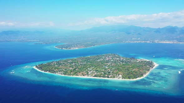 aerial seascape, tropical vacation and island hopping concept. Gilli air island and Lombok on a fogg alt
