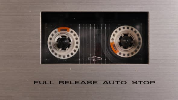 Old cassette player playing music retro style alt