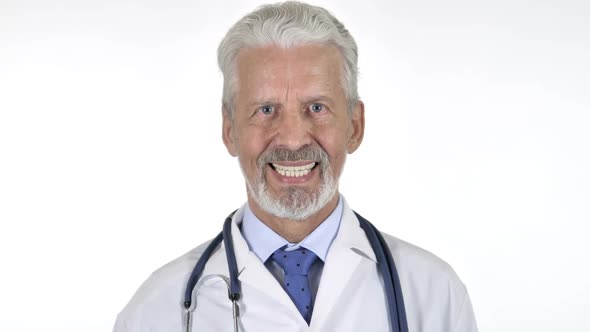 Portrait of Smiling Senior Doctor Isolated on White Background alt